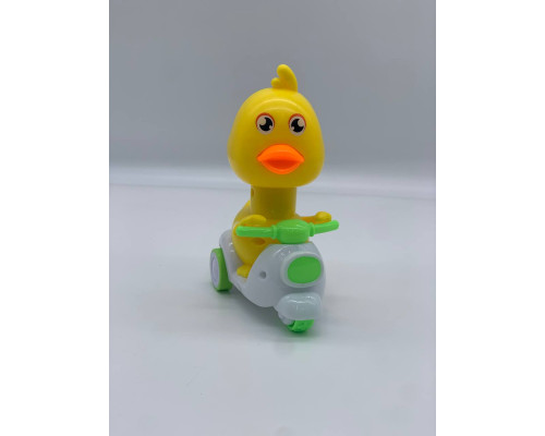 Инерционная игрушка маленькая желтая утка вращающаяся на 360 градусов Green (375)